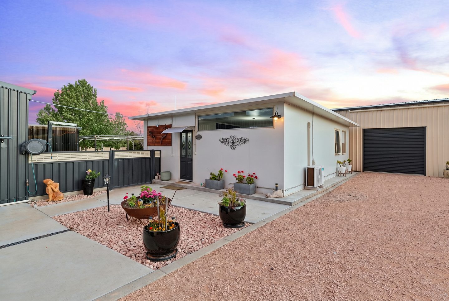 The bungalow exterior at dusk