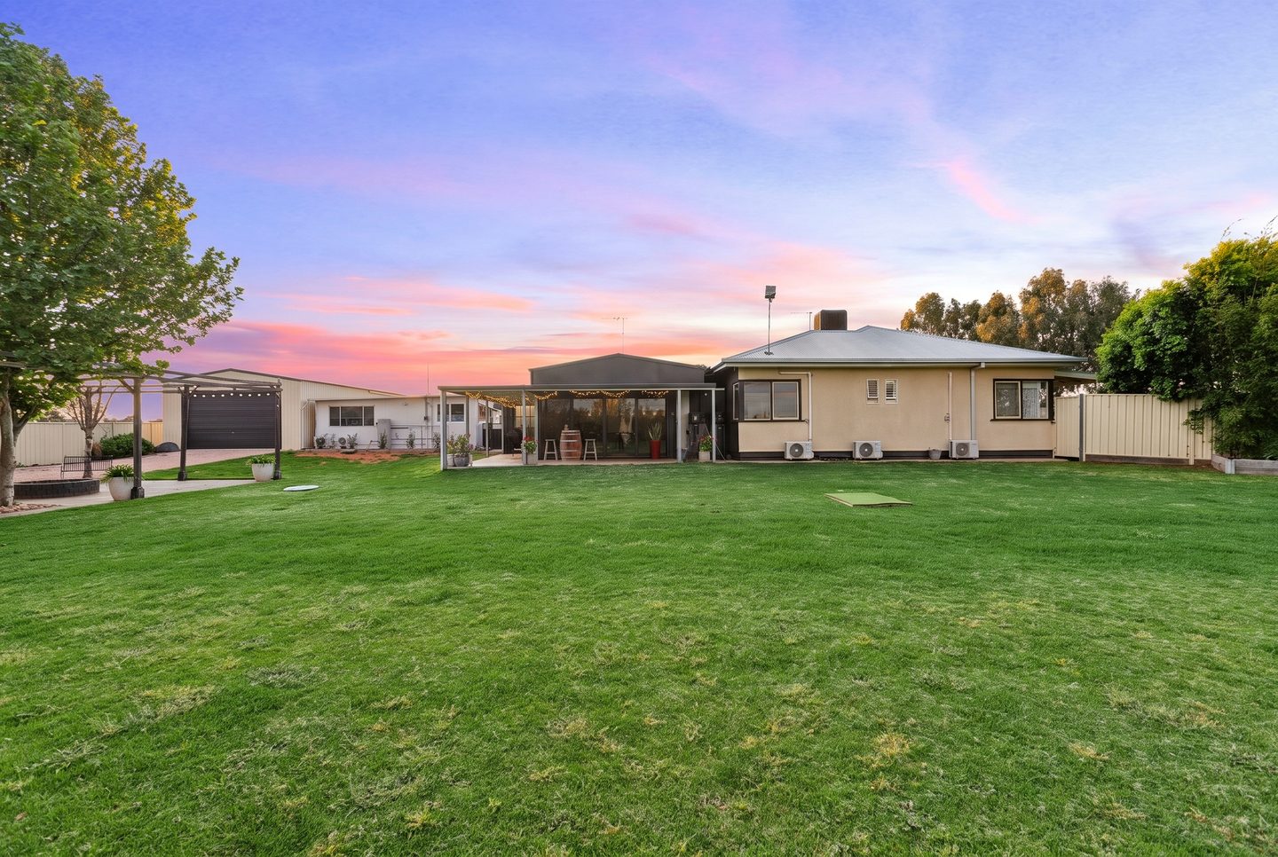 The residence and bungalow across the lawn