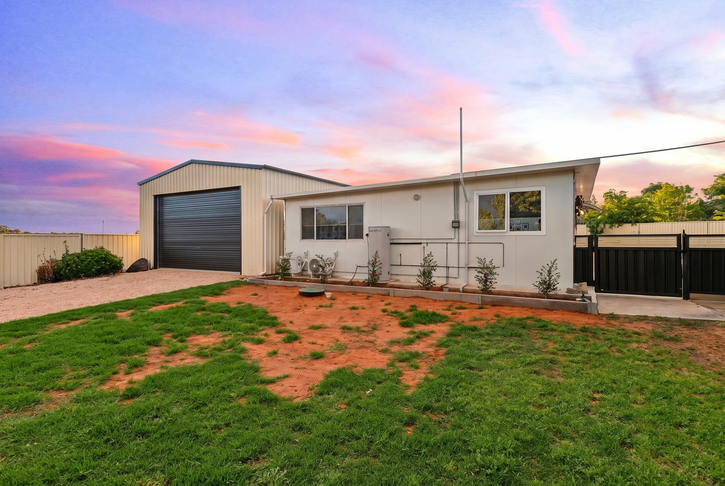 Bungalow and adjoining shed from the garden