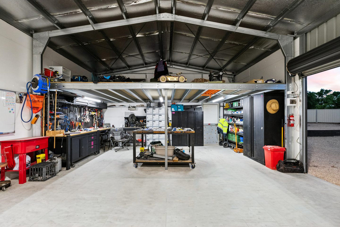 Shed interior showing the mezzanine and workshop space