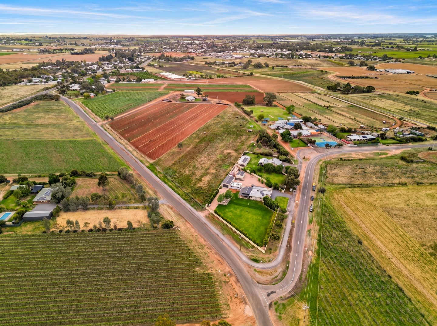 A wider aerial view of the property and Red Cliffs